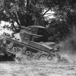 1st Armored Division M2A1 crushes a road block at Fort Knox ’41