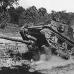 1st Armored Division M2A1 crushes a road block at Fort Knox 1941 2