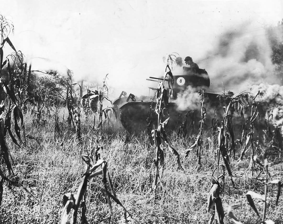 M2A2 tanks of the 192nd Tank Battalion roll through smoke screen during exercises in Arkansas 1941