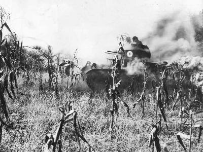 M2A2 tanks of the 192nd Tank Battalion roll through smoke screen during exercises in Arkansas 1941