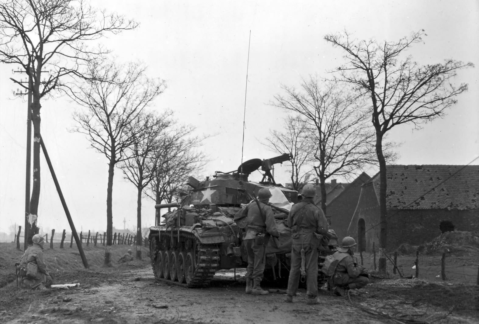 35th Infantry Division clearing Lintfort, Germany with M24 tank support