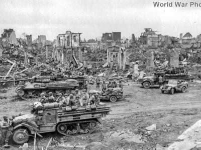 M36, M3 and Jeeps from 8th ID halted inside the ruins of Duren during Operation Grenade 23feb45