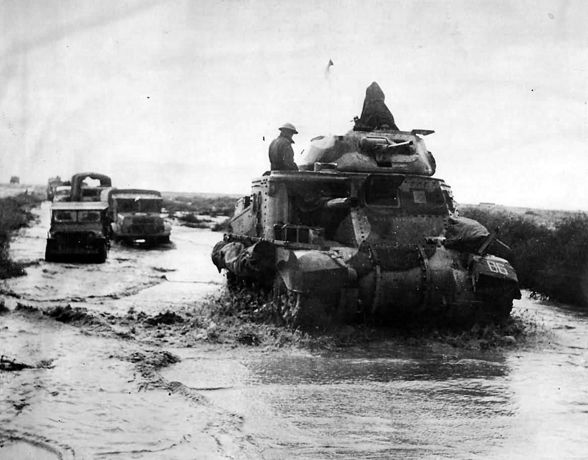 British M3 Grant Tank of 1st Armoured Division Heads Column of Jeeps and Trucks Western Desert November 1942