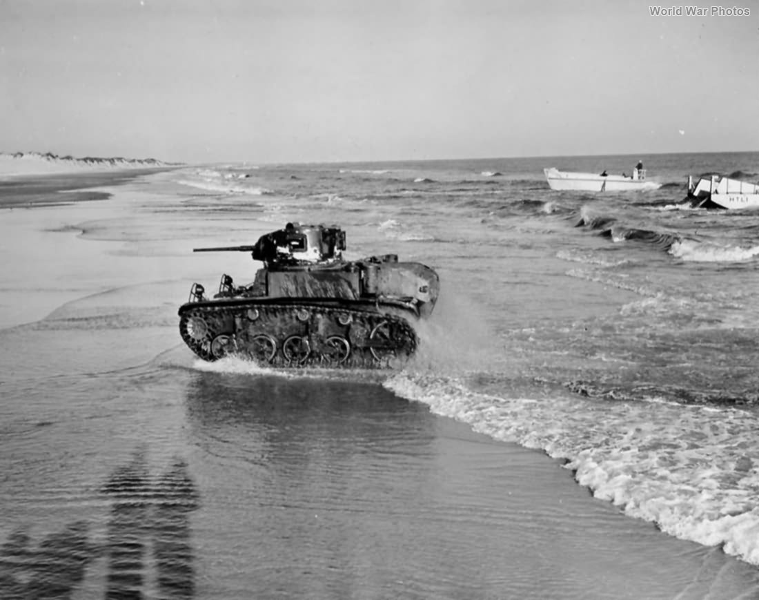 Marine M3A1 leaving landing craft New River NC ’42