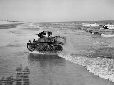 Marine M3A1 leaving landing craft New River NC ’42