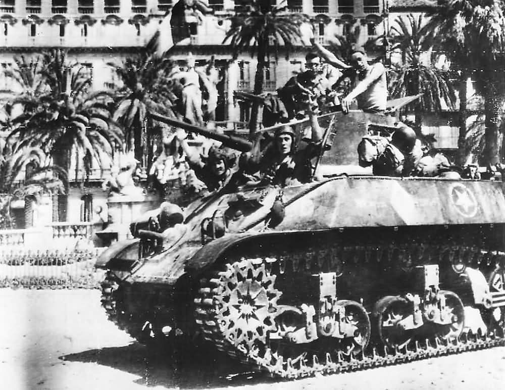 French Soldiers Wave From M3A3 Stuart tank Moving Thru Streets Toulon 1944