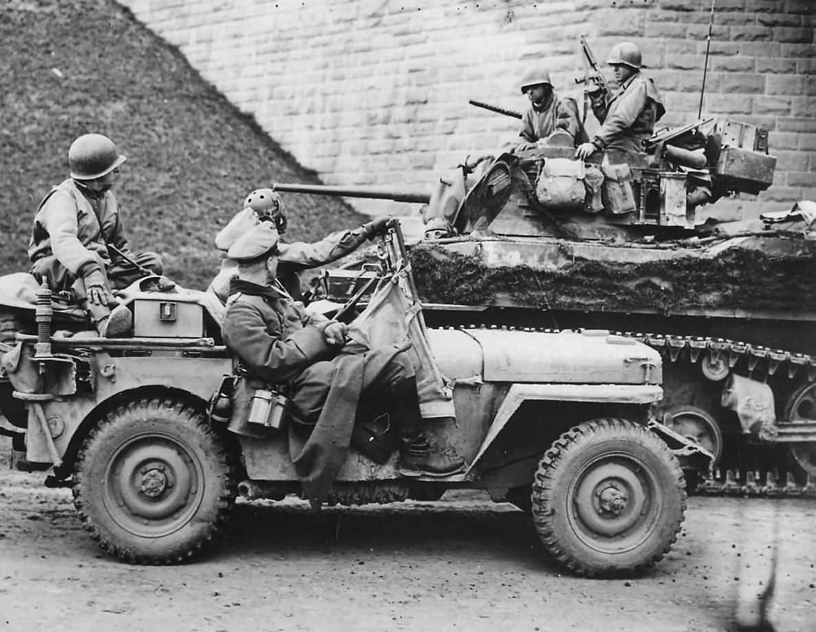 German POW by 4th Armored Div M5 Stuart Tank At Hersfeld