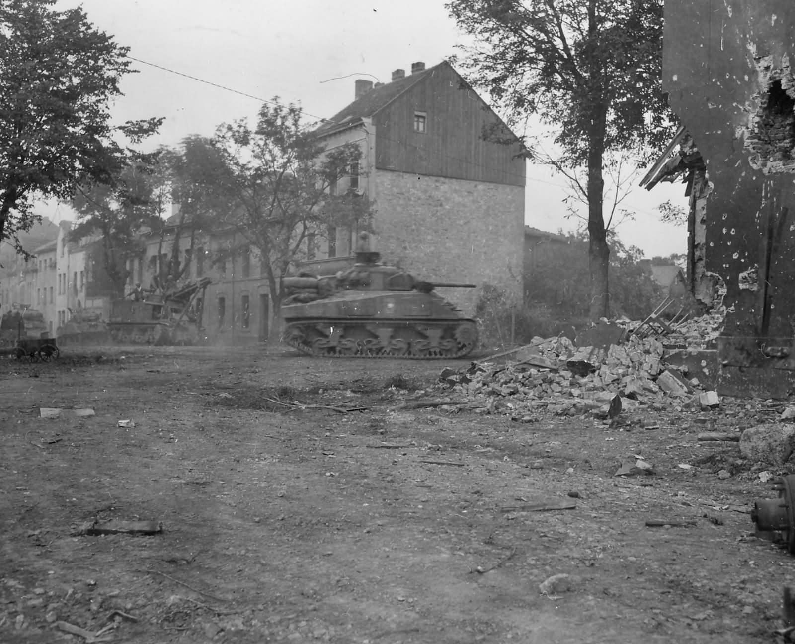 3rd Armored Division M4 Sherman and T2 Grant Recovery Vehicle Stolberg Germany 1945