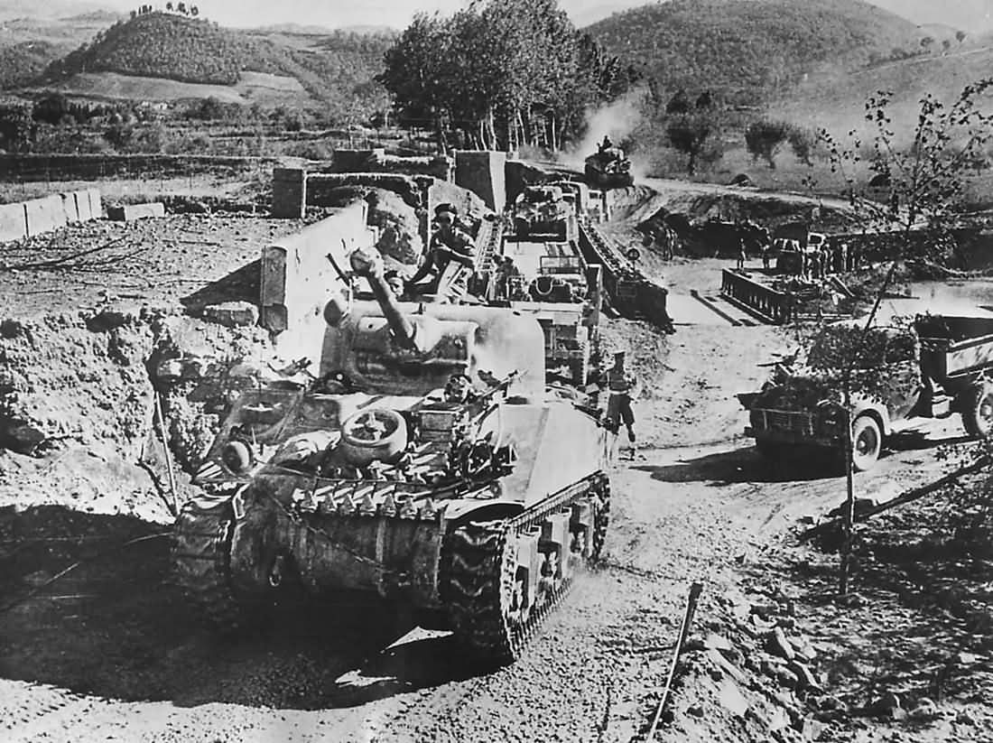 Canadian forces and M4 Sherman Tanks Advance over Sieve River in Italy