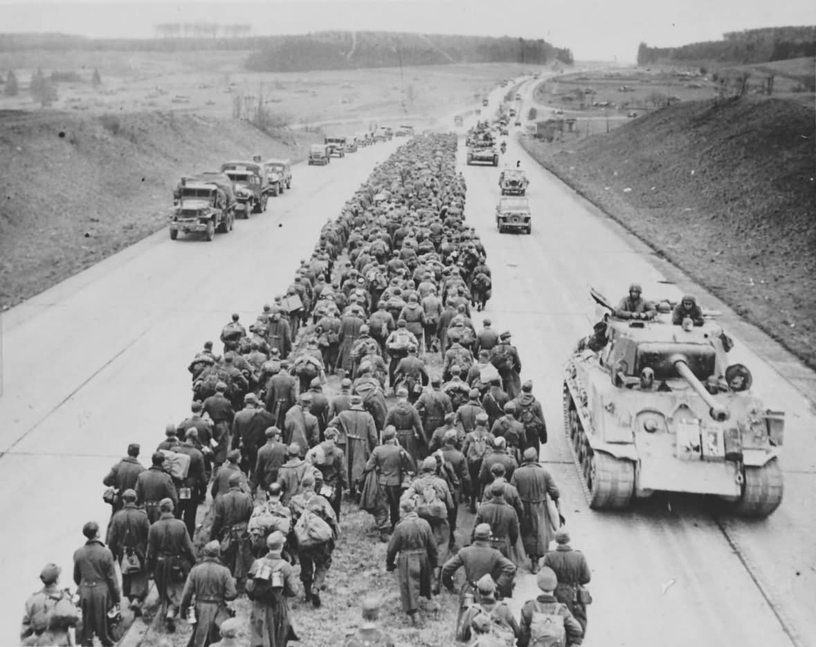 German Prisioners (Autobahn near Giesen) and M4A3E8 Sherman, March 29, 1945