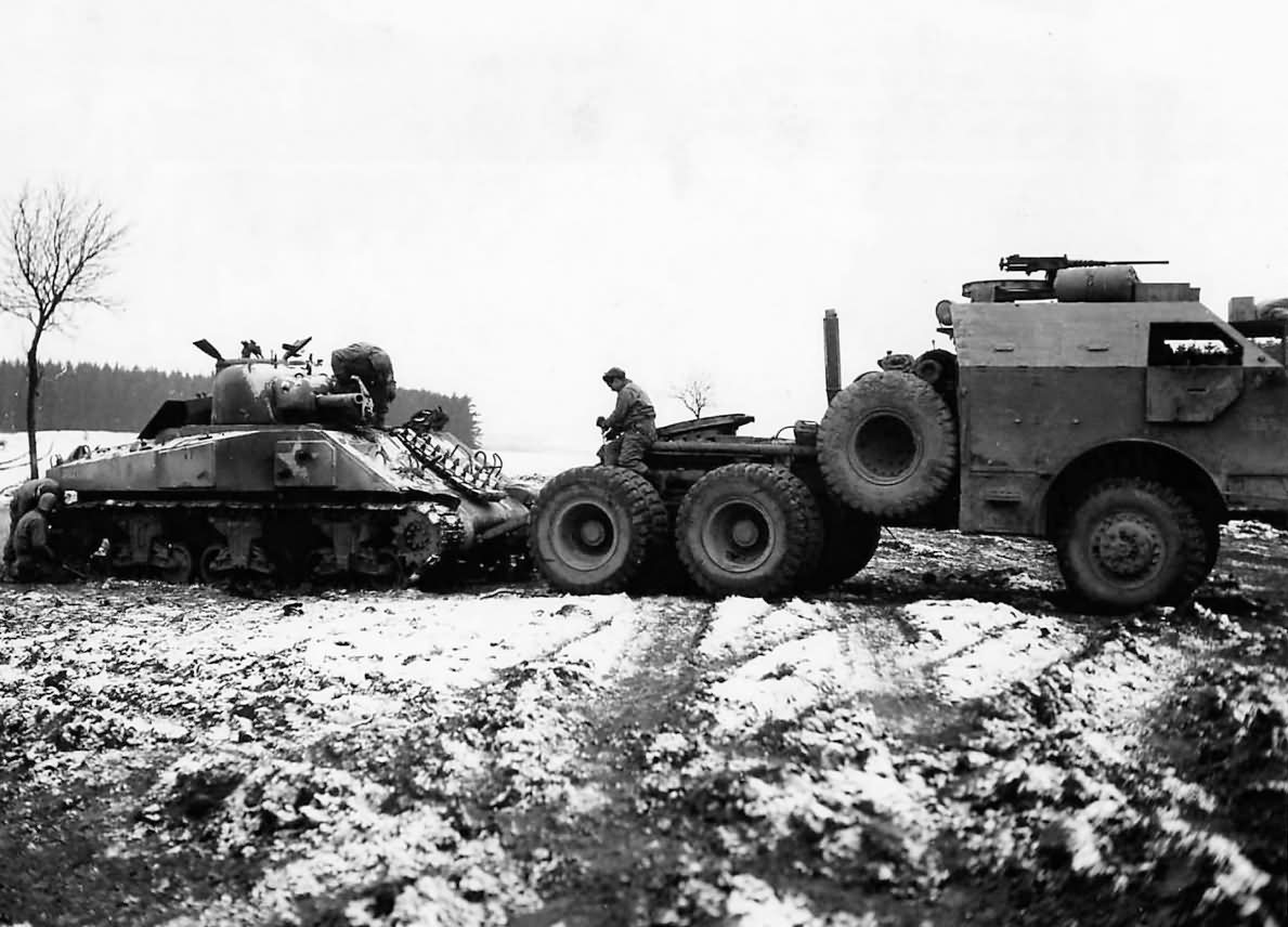 M26 Dragon Wagon of 4th Armored Division Hauls destroyed M4 Sherman near Bastogne Belgium