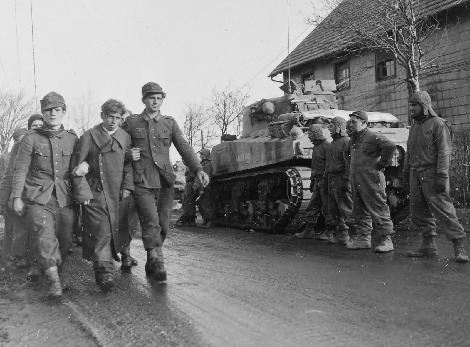 M4 Sherman 78th Infantry Division tank crew watches shell shocked german POW Lammersdorf