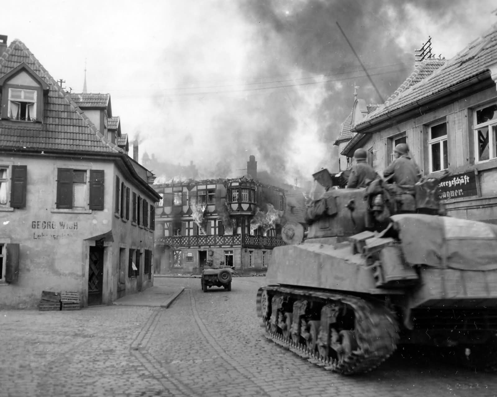 M4 Sherman of the 11th Armored division advance into Kronach Germany April 1945