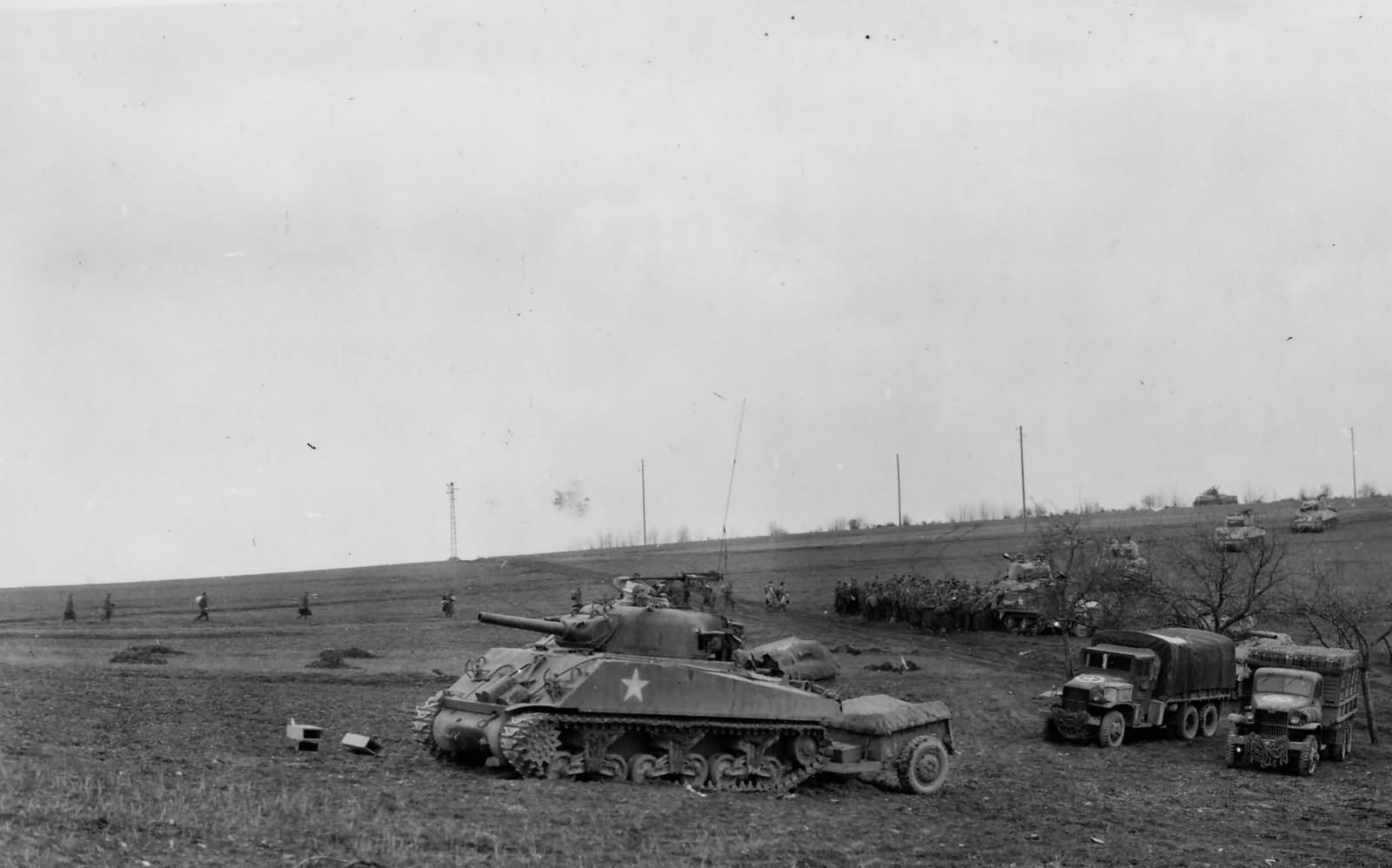 M4 Shermans 10th Armored Division M3 Halftracks 6×6 Trucks Trier Germany 1945