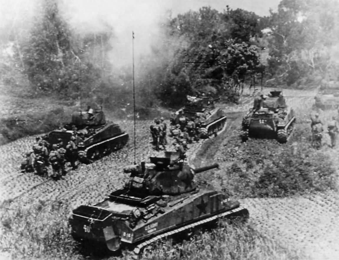 Troops and M4 Sherman tanks of 10th Army advancing on Okinawa