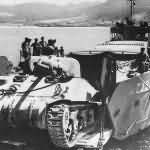 British Crew in LCT Loads M4 Sherman Tank on North African Coast