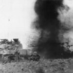M4 Sherman Tanks and troops of the 10th Army advance through a mine field on Okinawa