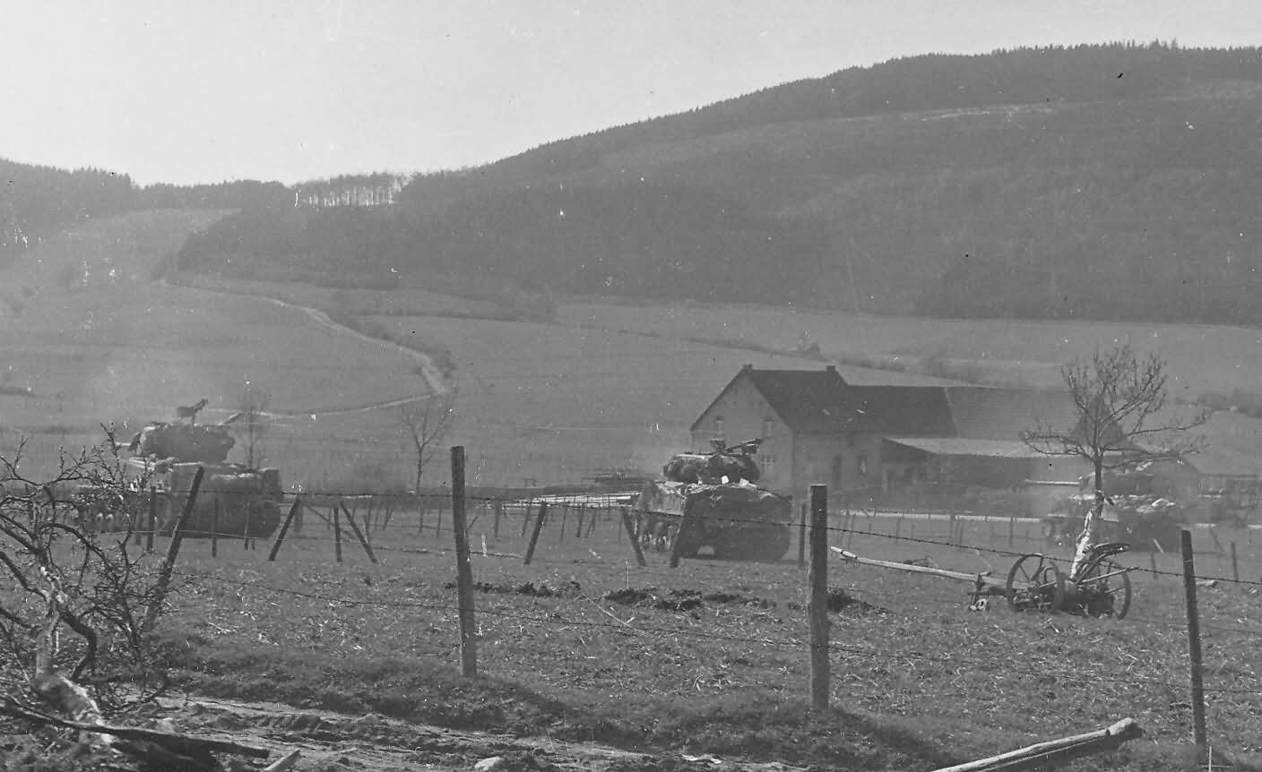 7th Armored Division M4 Sherman Tanks in action Grevenstein Germany 1945