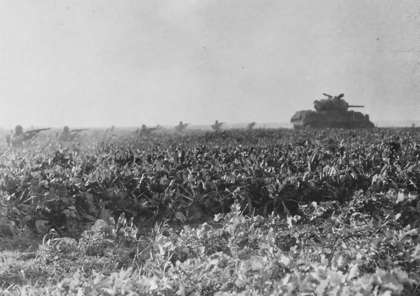 9th Army M4 tank and infantry team Germany November 1944