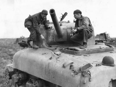 Crew Inspect Bomb Damage to M4A1 Sherman Tank in Nettuno 1944