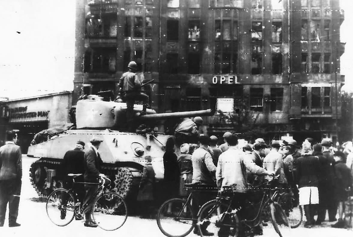 Crowd by US 2nd Armored Division M4 Tank at Opel Hotel in Berlin July 1945