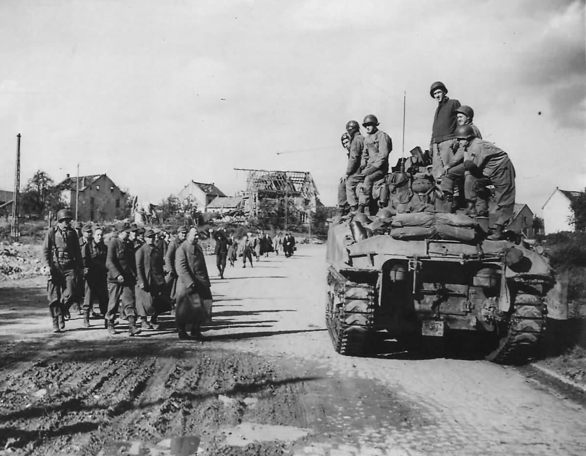 German Soldiers Surrender to 1st Army M4 Sherman Tank Crew in Aachen 1945