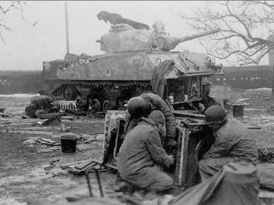 M4 105 mm Sherman Tank Crew Makes Repairs