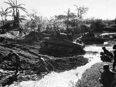 M4 Shermans and US Army 40th Inf GIs in mud at Negros Philippines 1945