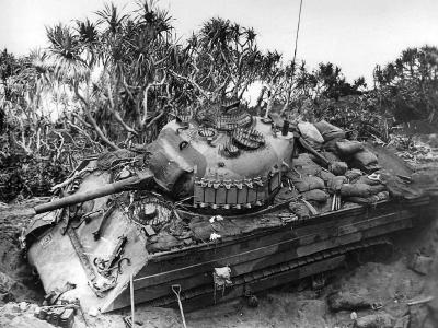 Marine M4A3 Sherman with wooden side armor, named Tokyo Express of the 5th Tank Battalion in ditch Iwo Jima