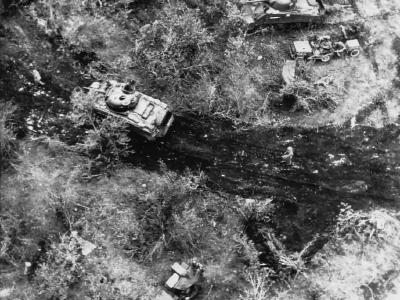 Marine M4 Sherman tank of the 2nd Tank Battalion gets ammo Tinian 1944