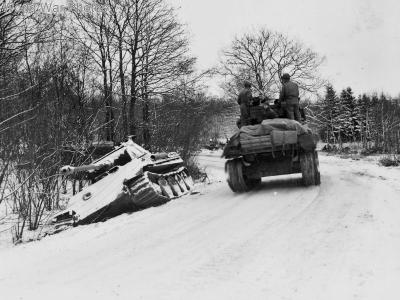 M4 of the 2nd Armoured Division passes Panther tank, Menil Belgium 2 January 1945