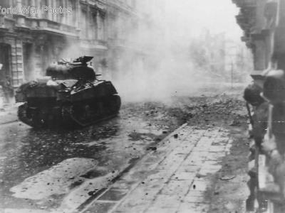 M4 Sherman of the 745th Tank Battalion supports 1st Infantry Division in Aachen