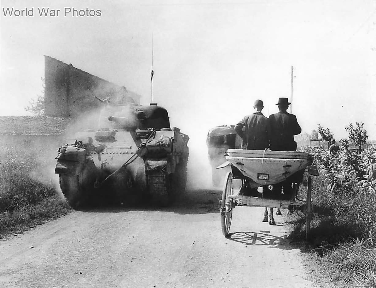 Italian farmers in a buggy pass an American M4 on a country road near Salerno 43