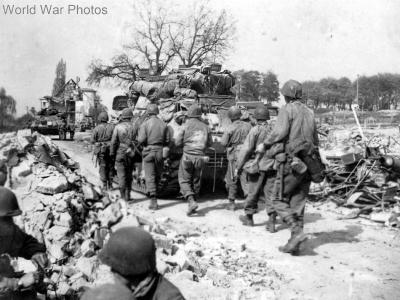 M4 tanks and 70th Infantry Division approaching Nuremberg 18 April 1945