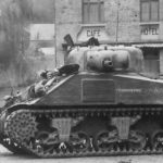 M4 of the 33rd AR, 3rd AD guarding the crossroads in Spontin Belgium September 1944