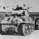 Sherman camouflaged with sheets in Samree Belgium January 1945