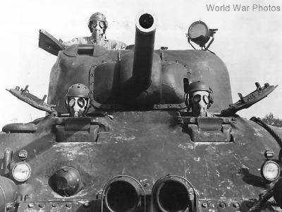 Gas Masked tank crew training in M4 1942