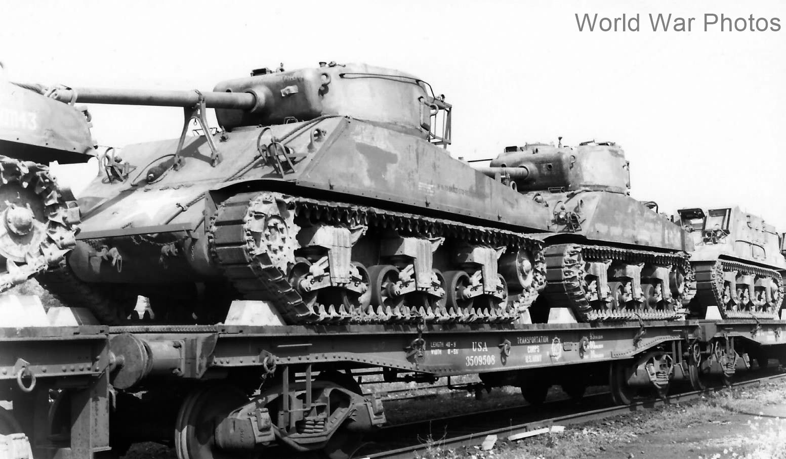 M4A1(76) tanks on railroad flat cars in transit to the front Holland 1944