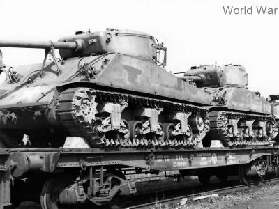 M4A1(76) tanks on railroad flat cars in transit to the front Holland 1944