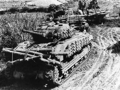 M4A2 Sherman with logs