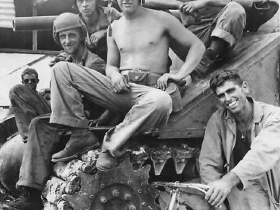 Marine M4 tank crew rests after Battle in Agana Guam