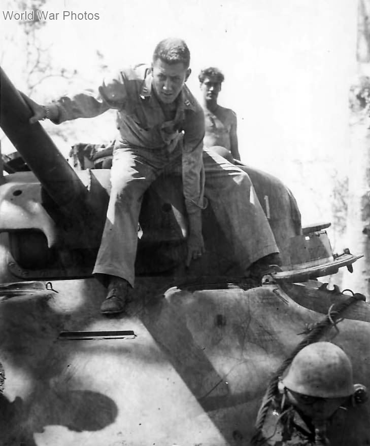 Marine points to hits scored on M4 tank on Cape Gloucester 44