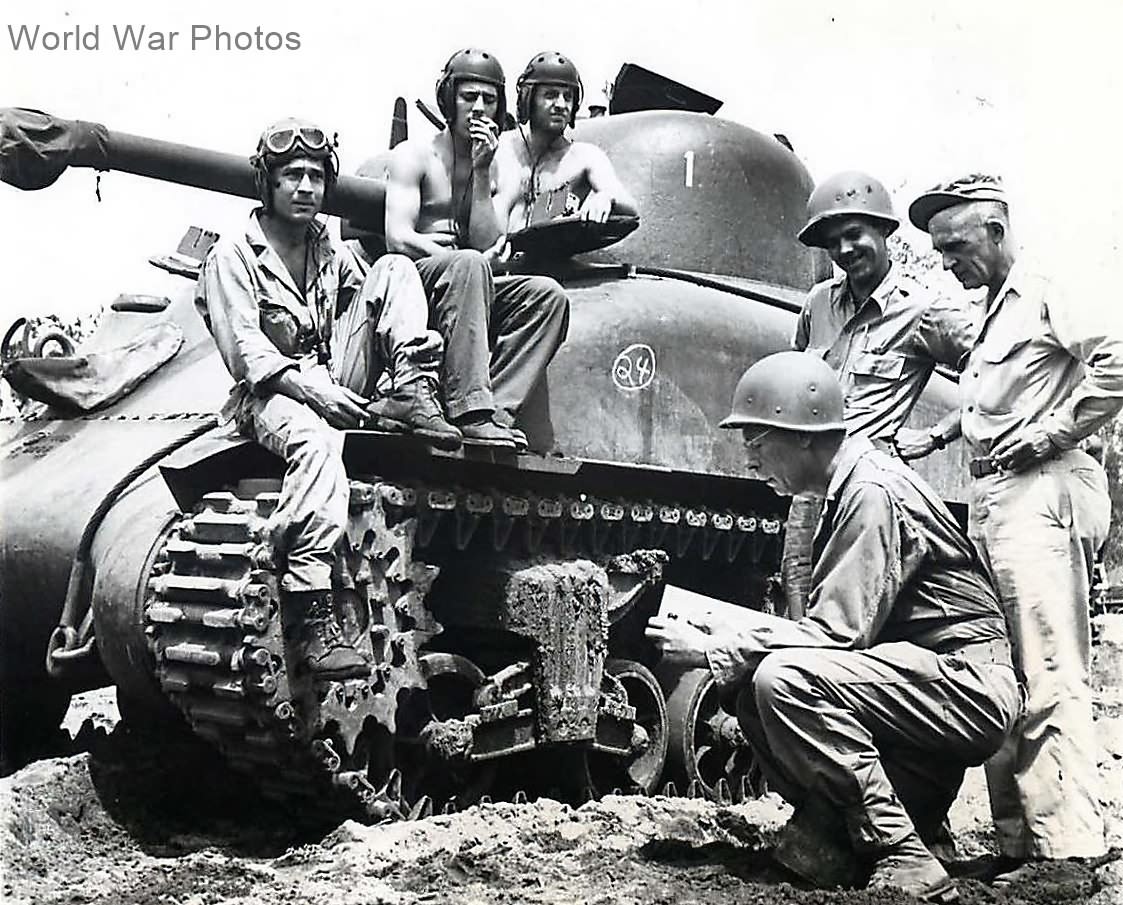 Tribune artist Gary Sheahan sketches M4A1 tank crew in New Guinea 1944