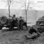 3rd AD medic treats wounded under fire Korbach Germany 5 March 1945
