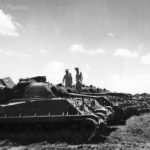 Shermans M4A3E8(75)W HVSS lined up at depot near Manila 1945