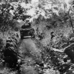 Marines and 1st Tank Battalion M4 Sherman advancing on Cape Gloucester 1944