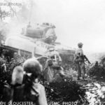 Marines follow tank M4A1 Jungle Cape Gloucester
