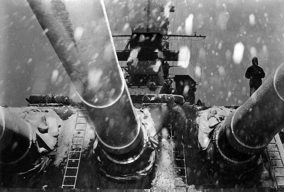 Snow falling over 16 Inch (406 mm) guns of battleship USS Alabama BB-60, 1944