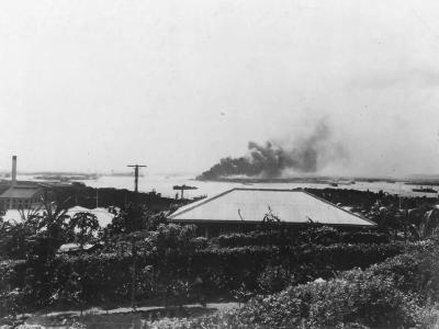 Battleship USS Arizona (BB-39) burning after Japanese Attack on Pearl Harbor 7 December 1941