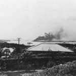 Battleship USS Arizona (BB-39) burning after Japanese Attack on Pearl Harbor 7 December 1941